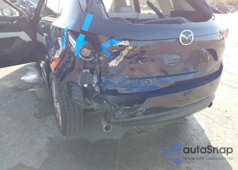 2021 Mazda Cx-5 Grand Touring z USA, uszkodzony, nr VIN JM3KFADM9M0350587